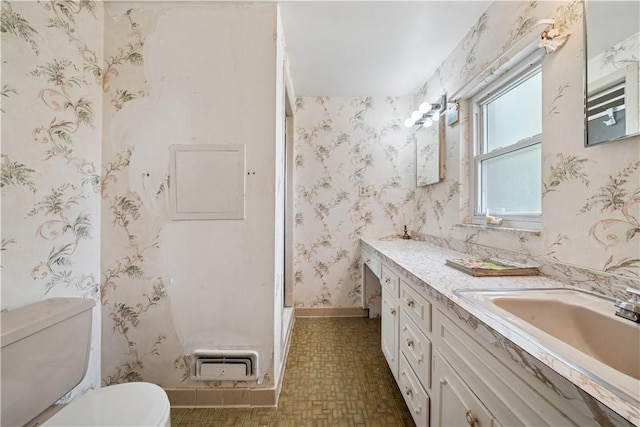 431 Darrell Dr, Penn Hills, PA 15235 - bathroom with vanity, toilet, wallpapered walls, a shower, and baseboards