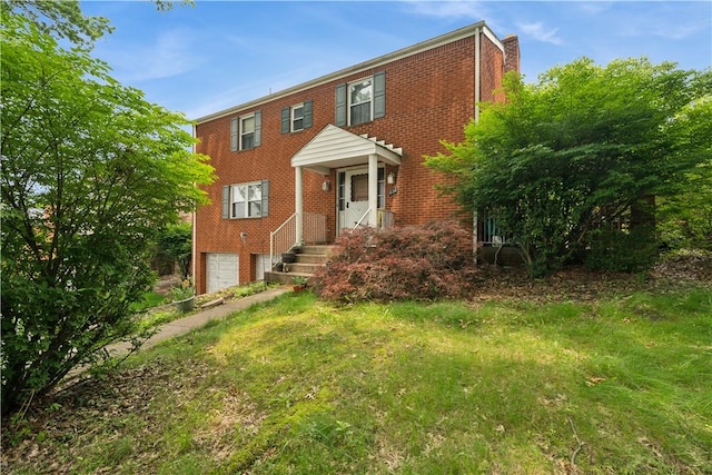 431 Darrell Dr, Penn Hills, PA 15235 - view of front of home with brick siding and an attached garage