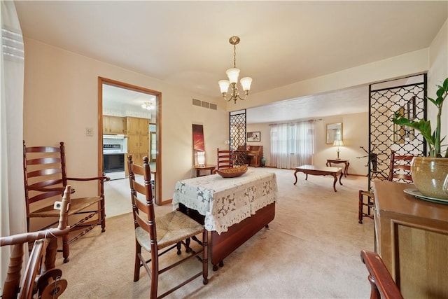 431 Darrell Dr, Penn Hills, PA 15235 - bedroom with light colored carpet and a chandelier