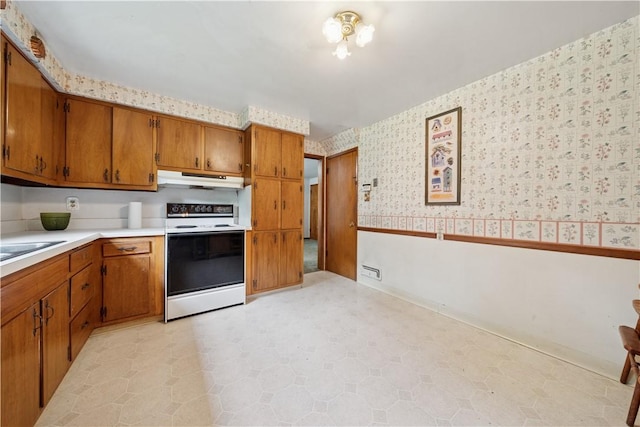 431 Darrell Dr, Penn Hills, PA 15235 - kitchen featuring white electric range oven, wallpapered walls, brown cabinetry, light countertops, and under cabinet range hood