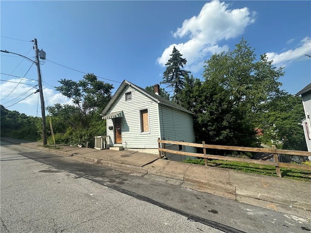 228 Walnut St, Donora, PA 15033 - view of front of home with a chimney
