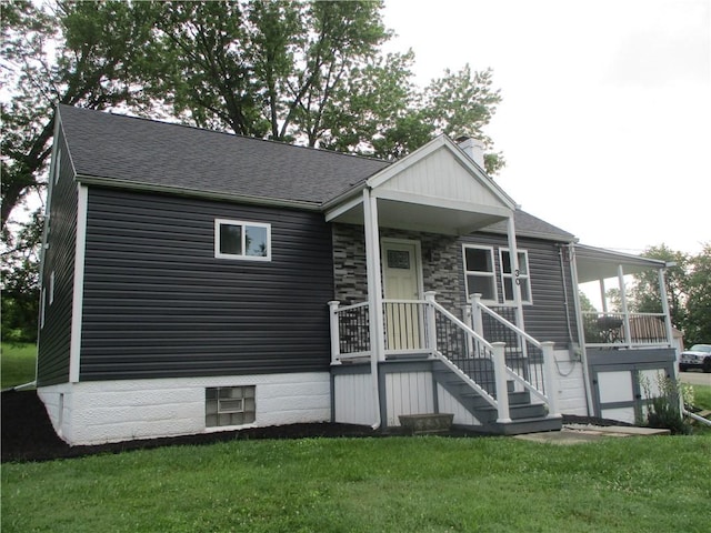 30 Evans Rd, Fallowfield, PA 15022 - view of front of house with a chimney, a front yard, and roof with shingles