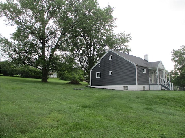 30 Evans Rd, Fallowfield, PA 15022 - view of property exterior with a chimney and a yard