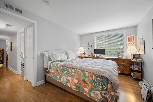 3266 Ward St Unit 8, Oakland, PA 15213 - bedroom with wood finished floors and baseboards