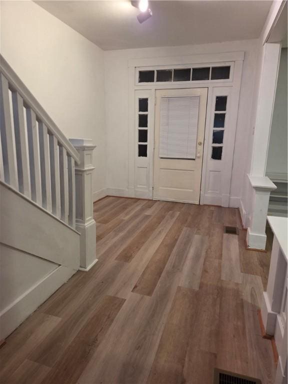 518 Waddell Ave, Clairton, PA 15025 - foyer with stairs, wood finished floors, and baseboards