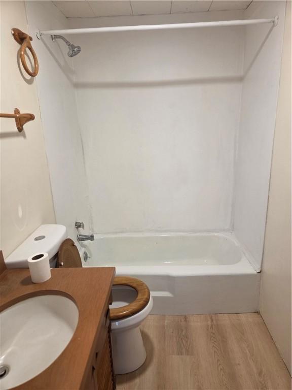 518 Waddell Ave, Clairton, PA 15025 - bathroom with toilet, wood finished floors, shower / bath combination, and vanity