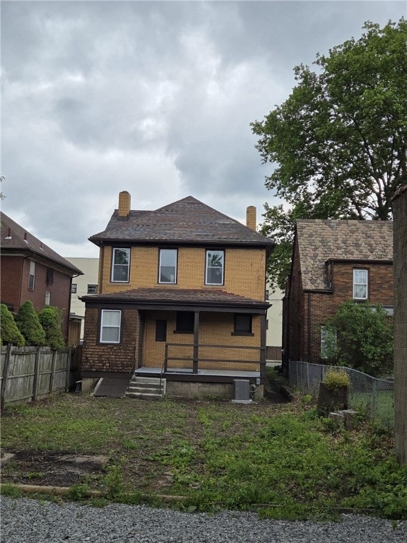 518 Waddell Ave, Clairton, PA 15025 - rear view of property with a chimney, cooling unit, and covered porch