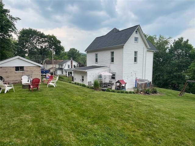213 Bratchie St, Mars Boro, PA 16046 - back of house featuring a lawn and roof with shingles