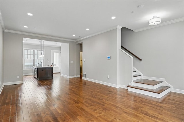 1621 Overton Ln, Squirrel Hill, PA 15217 - unfurnished living room featuring dark wood-style floors, crown molding, baseboards, stairway, and recessed lighting