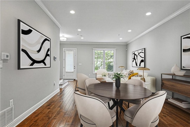 1621 Overton Ln, Squirrel Hill, PA 15217 - dining space with dark wood finished floors, ornamental molding, recessed lighting, and baseboards