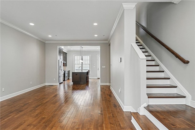 1621 Overton Ln, Squirrel Hill, PA 15217 - unfurnished living room featuring ornamental molding, dark wood-style floors, recessed lighting, stairway, and baseboards
