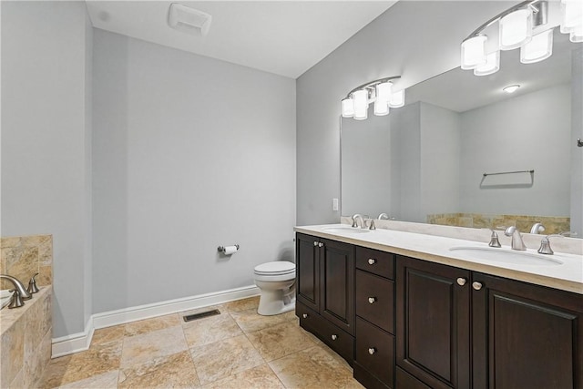 1621 Overton Ln, Squirrel Hill, PA 15217 - full bath featuring double vanity, a bath, toilet, and baseboards