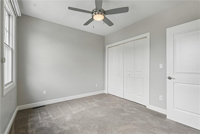 1621 Overton Ln, Squirrel Hill, PA 15217 - unfurnished bedroom with carpet floors, a closet, baseboards, and multiple windows