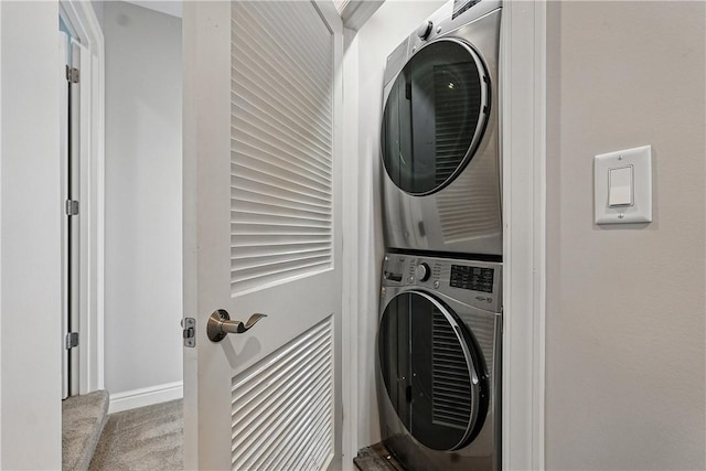 1621 Overton Ln, Squirrel Hill, PA 15217 - laundry area with stacked washing machine and dryer, carpet floors, and baseboards