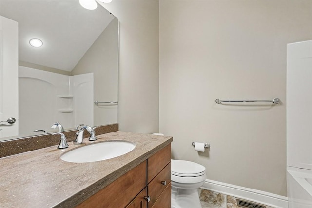 1621 Overton Ln, Squirrel Hill, PA 15217 - bathroom featuring vanity, toilet, vaulted ceiling, tile patterned floors, and baseboards