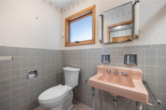 194 Southvue Dr, Whitehall, PA 15236 - half bath with wallpapered walls, a wainscoted wall, tile walls, and toilet
