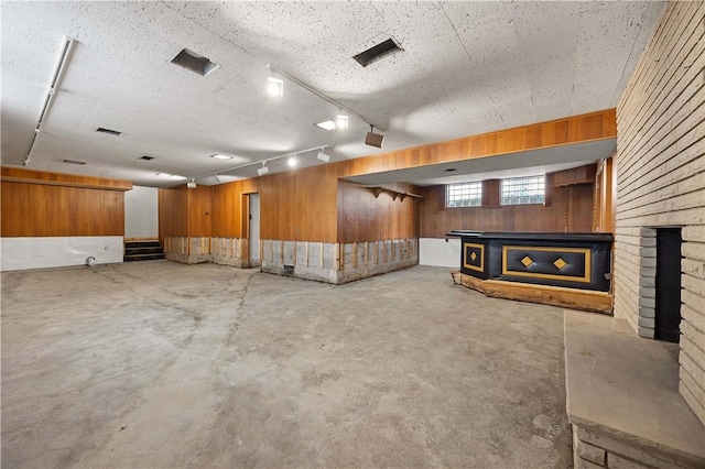 194 Southvue Dr, Whitehall, PA 15236 - basement with wooden walls, rail lighting, and bar area