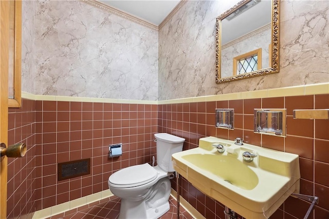 194 Southvue Dr, Whitehall, PA 15236 - bathroom with tile walls, toilet, and tile patterned flooring
