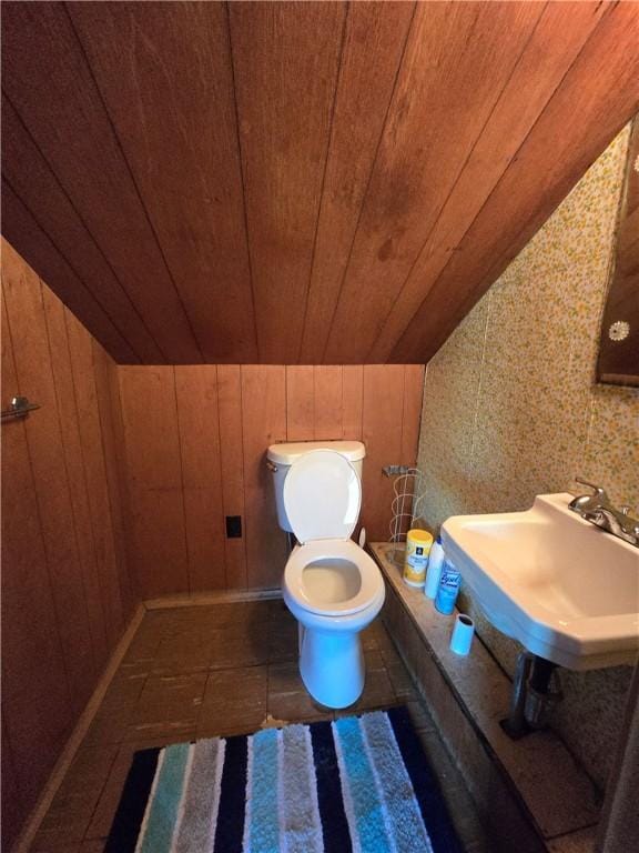 229 Bluff St, Canonsburg, PA 15317 - bathroom with wood ceiling, toilet, a sink, vaulted ceiling, and tile patterned flooring
