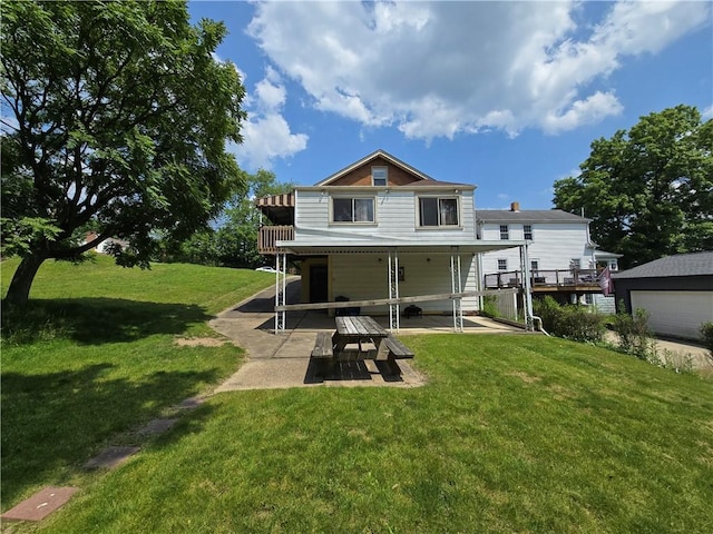 229 Bluff St, Canonsburg, PA 15317 - rear view of property with a patio and a lawn