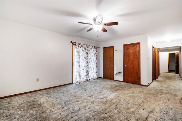 2712 State Route 351, Little Beaver Twp, PA 16120 - unfurnished bedroom featuring light colored carpet, two closets, baseboards, and a ceiling fan