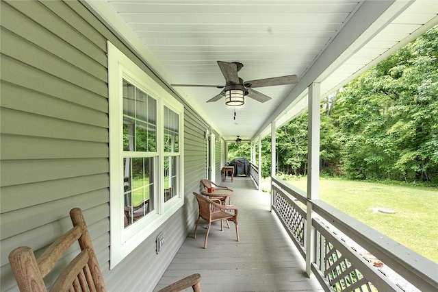 40 Walter Rd, Pine Twp Mer, PA 16127 - wooden porch featuring a lawn, a ceiling fan, and a grill