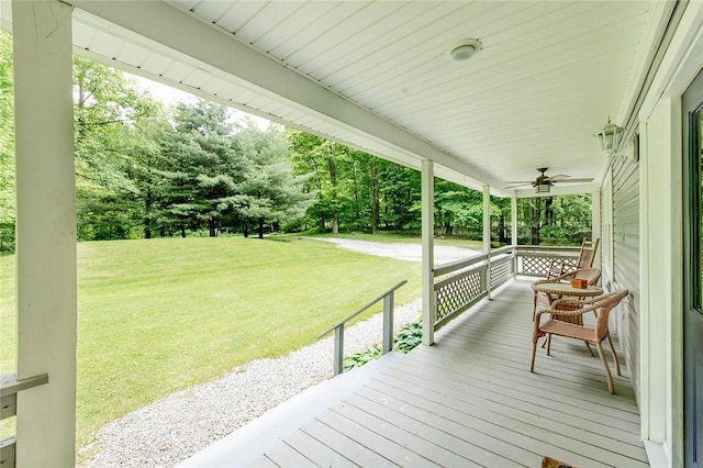 40 Walter Rd, Pine Twp Mer, PA 16127 - wooden porch with a lawn, a ceiling fan, and view of scattered trees