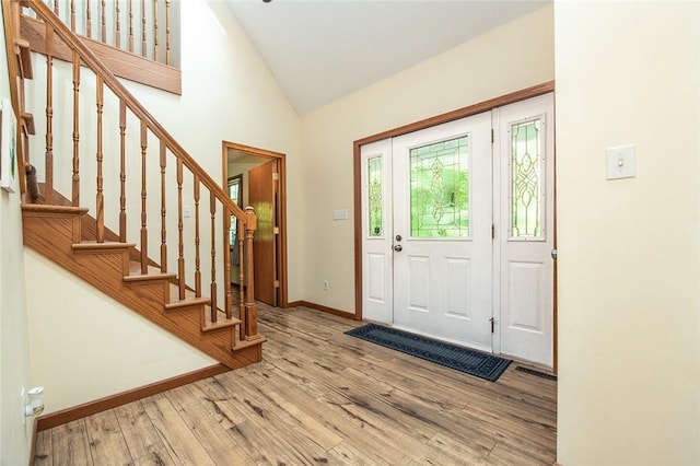 40 Walter Rd, Pine Twp Mer, PA 16127 - foyer entrance featuring wood finished floors, vaulted ceiling, stairway, and baseboards