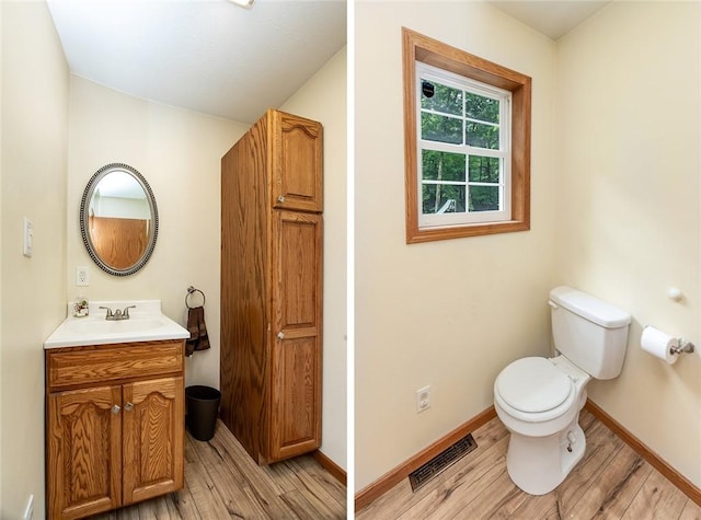 40 Walter Rd, Pine Twp Mer, PA 16127 - half bathroom with toilet, wood finished floors, vanity, and baseboards