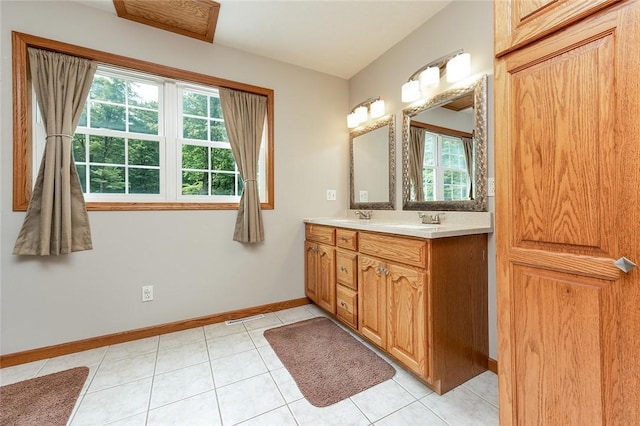 40 Walter Rd, Pine Twp Mer, PA 16127 - bathroom with healthy amount of natural light, double vanity, baseboards, and tile patterned flooring