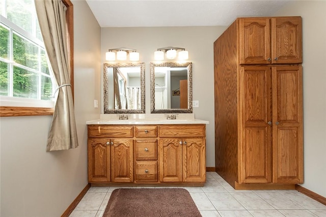 40 Walter Rd, Pine Twp Mer, PA 16127 - full bath featuring baseboards, double vanity, and tile patterned floors