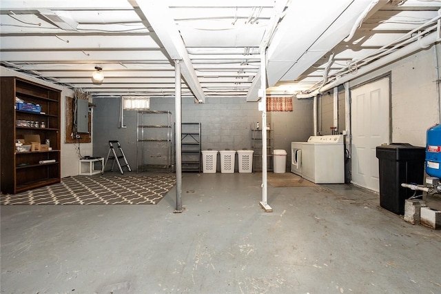 40 Walter Rd, Pine Twp Mer, PA 16127 - unfinished basement featuring washing machine and dryer, concrete block wall, and electric panel