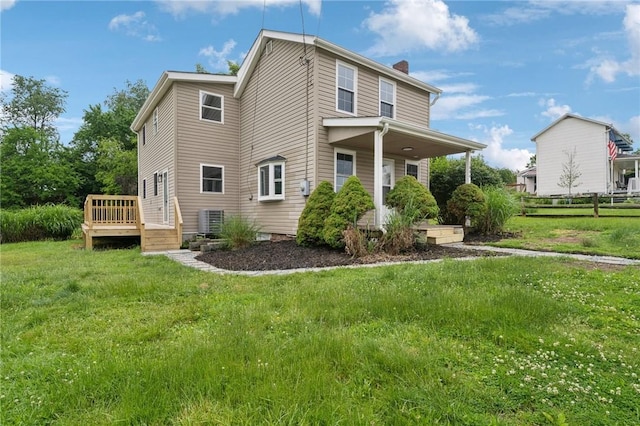 1004 Government Rd, Penn Twp Wml, PA 15642 - back of property featuring a deck, a chimney, and central AC