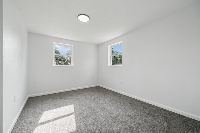 1004 Government Rd, Penn Twp Wml, PA 15642 - carpeted empty room with plenty of natural light and baseboards