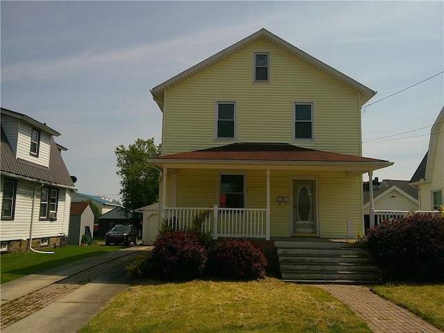 152 E Garrett St, Somerset Twp, PA 15501 - american foursquare style home with a porch and a front lawn