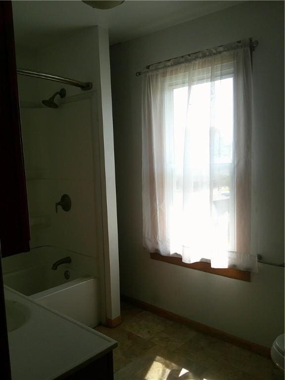 152 E Garrett St, Somerset Twp, PA 15501 - full bathroom featuring vanity, baseboards,  shower combination, and toilet