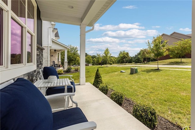 582 Forest Oaks Trl, North Huntingdon, PA 15642 - covered porch featuring a yard and ceiling fan