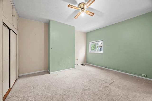 30 4th St, Aspinwall, PA 15215 - unfurnished bedroom featuring light colored carpet, baseboards, a closet, and ceiling fan