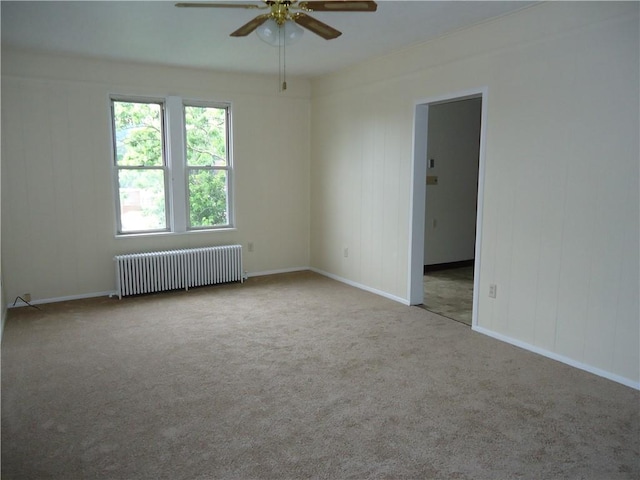 30 Coulter St, Crafton, PA 15205 - unfurnished room featuring radiator heating unit, a ceiling fan, carpet floors, and baseboards