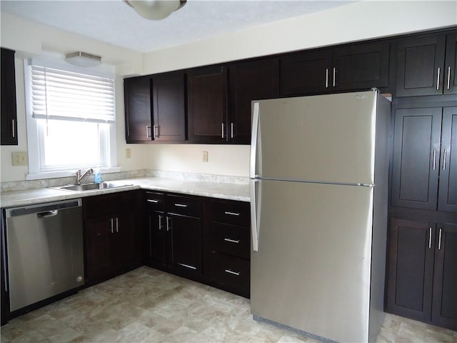 30 Coulter St, Crafton, PA 15205 - kitchen featuring freestanding refrigerator, stainless steel dishwasher, a sink, and light countertops