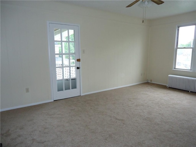 30 Coulter St, Crafton, PA 15205 - carpeted empty room with radiator, a ceiling fan, plenty of natural light, and baseboards