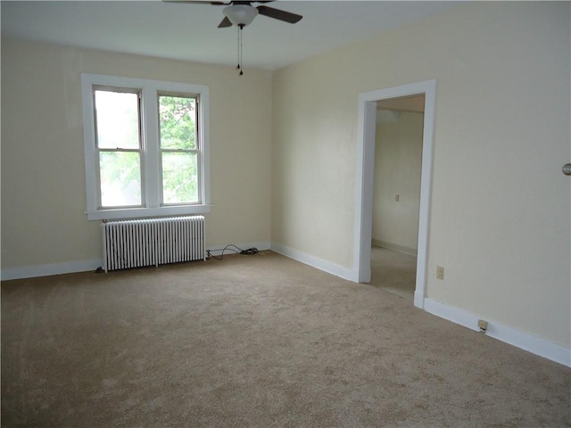 30 Coulter St, Crafton, PA 15205 - empty room with radiator, a ceiling fan, carpet flooring, and baseboards