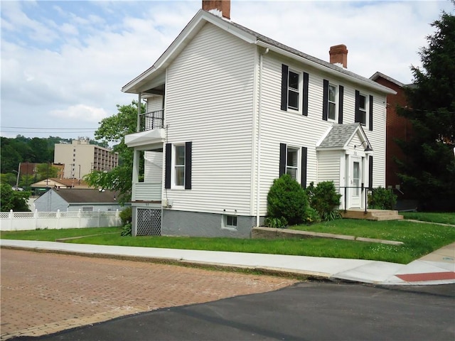 30 Coulter St, Crafton, PA 15205 - view of side of home featuring a chimney and a balcony
