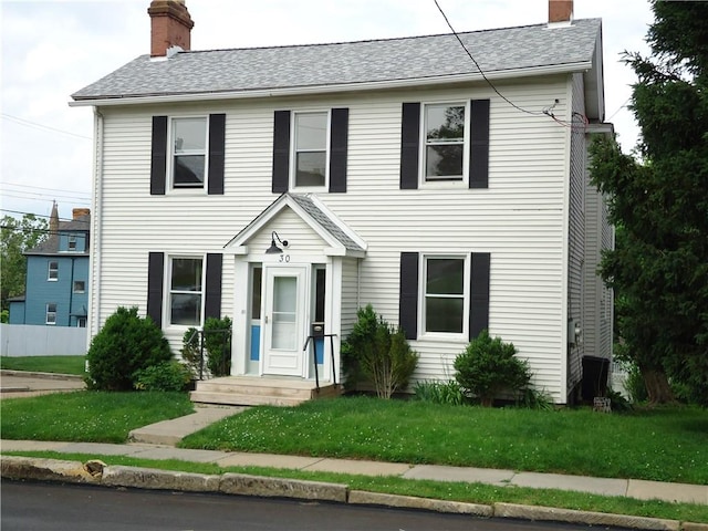 30 Coulter St, Crafton, PA 15205 - view of front of house with a chimney, a front lawn, and a shingled roof