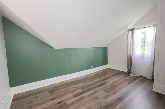 409 Summit St, Grove City Boro, PA 16127 - additional living space with lofted ceiling and wood finished floors