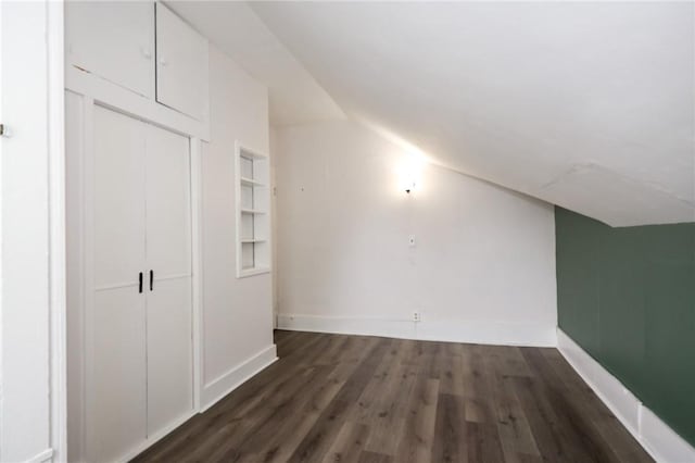 409 Summit St, Grove City Boro, PA 16127 - bonus room featuring dark wood finished floors, lofted ceiling, and built in features