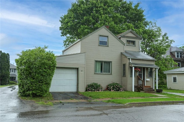 409 Summit St, Grove City Boro, PA 16127 - view of front of house featuring an attached garage and asphalt driveway