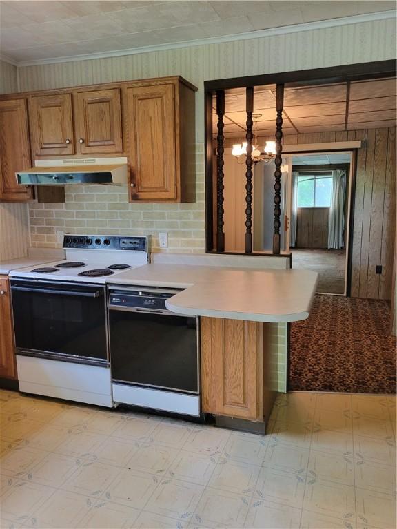 36 Daisytown Rd, Centerville, PA 15427 - kitchen with white electric stove, dishwasher, under cabinet range hood, brown cabinets, and light floors