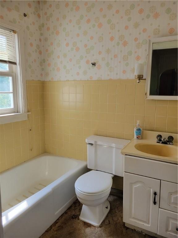 36 Daisytown Rd, Centerville, PA 15427 - bathroom with wallpapered walls, a tub to relax in, toilet, vanity, and wainscoting