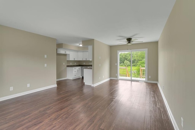 683 Mercer New Wilmington Rd, E Lackawannock Twp, PA 16137 - unfurnished living room featuring a ceiling fan, dark wood-style floors, and baseboards